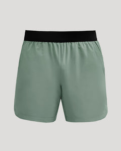 True Classic7 Juniper Active Training Shorts 2.0, sage-green with black waistband, mid-thigh.
