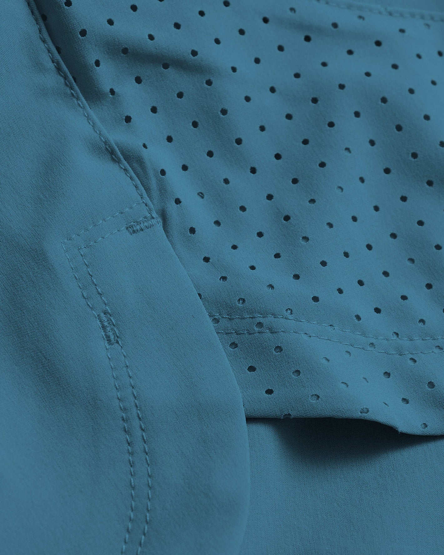 Sapphire 7 Active Training Short fabric with perforated ventilation and stitching.