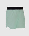 7 Slate Green Active Training Shorts 2.0 with black waistband and side slits.