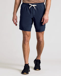 True Classic9 Active Quick Dry Shorts 3-Pack worn with black athletic sneakers.