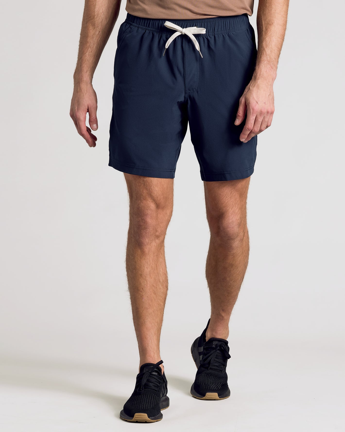 9 Active Quick Dry Shorts 3-Pack worn with black athletic sneakers.