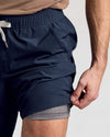 Navy 9 Active Quick Dry Shorts with gray compression liner visible.