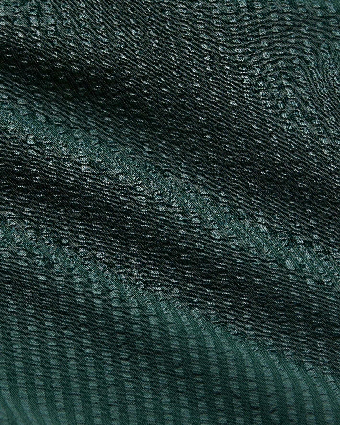 7 Marine Spruce Seersucker Swim Trunks with textured waffle weave.