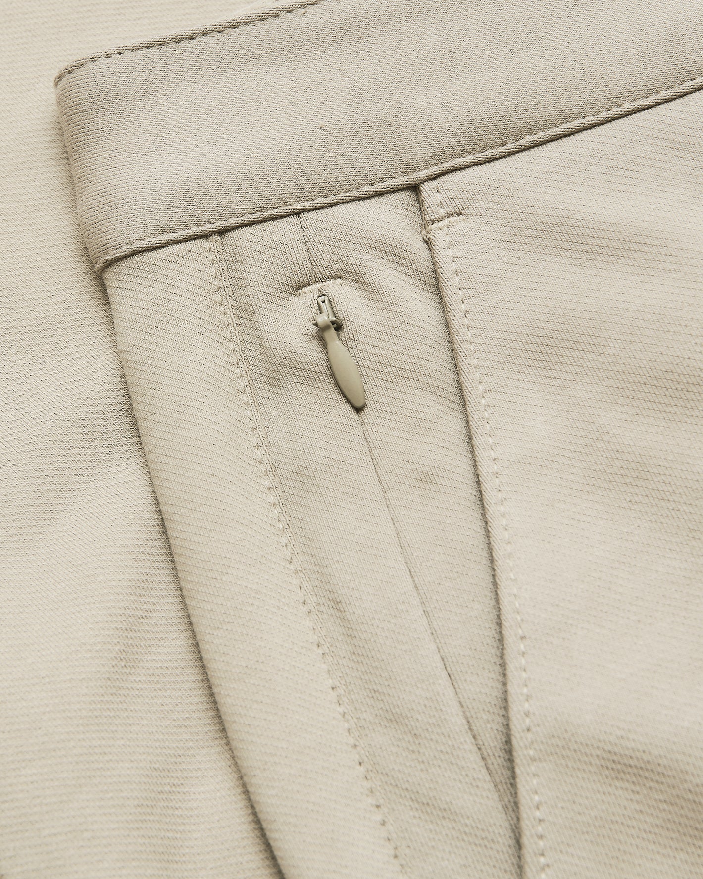 7 Sandstone Chino Shorts 2.0 waistband with side zip pocket detail.