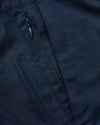 7 Navy Linen Shorts with woven texture and zippered pocket detail.