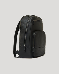 True ClassicPremium Leather Backpack with zippered compartments and padded shoulder straps.