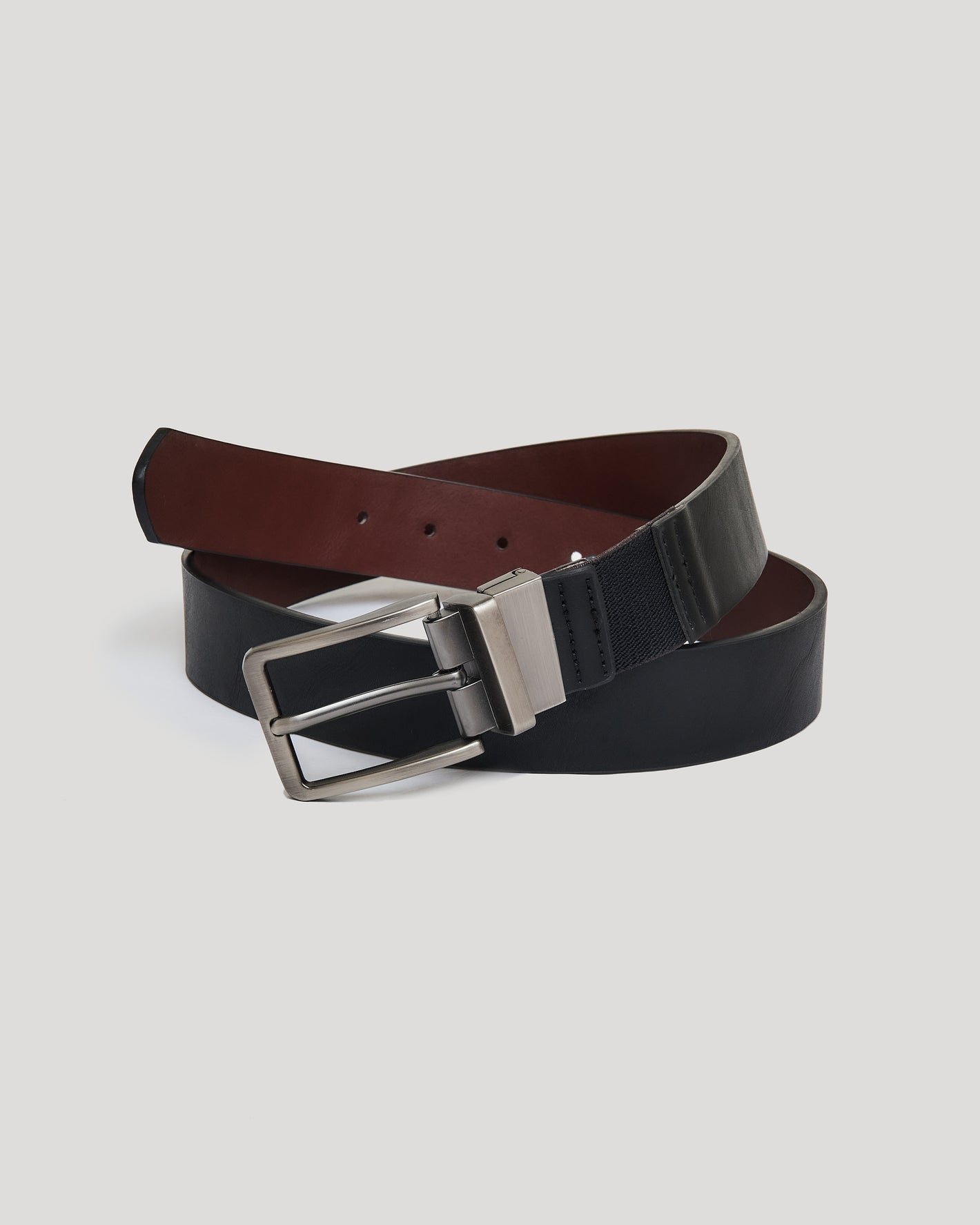 Casual Reversible Stretch Belt with black and brown sides, satin-nickel buckle.