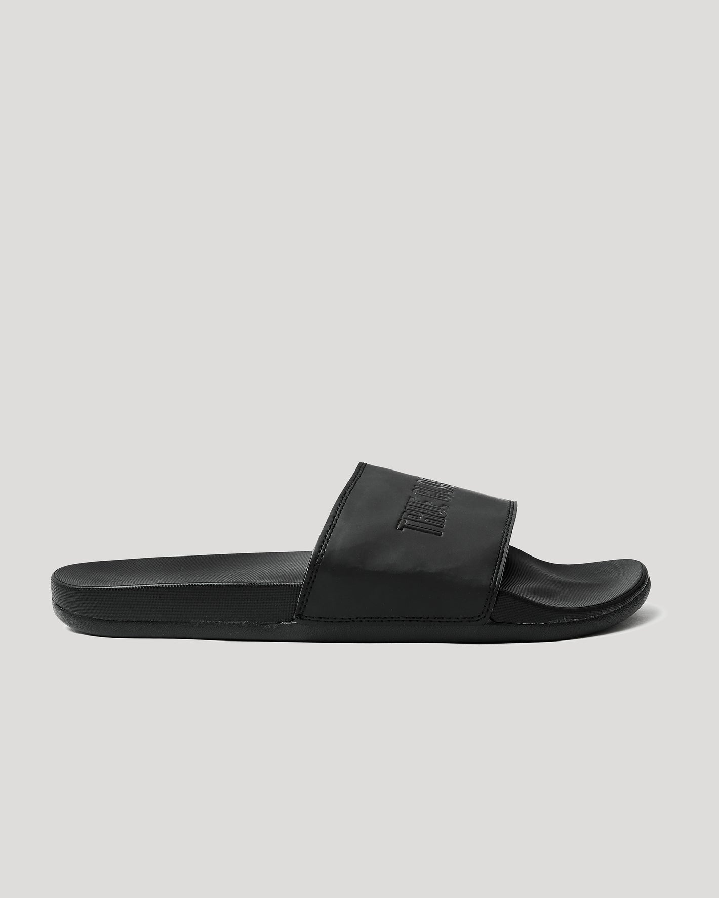 Black Comfort Slides with a contoured footbed and rubberized strap.