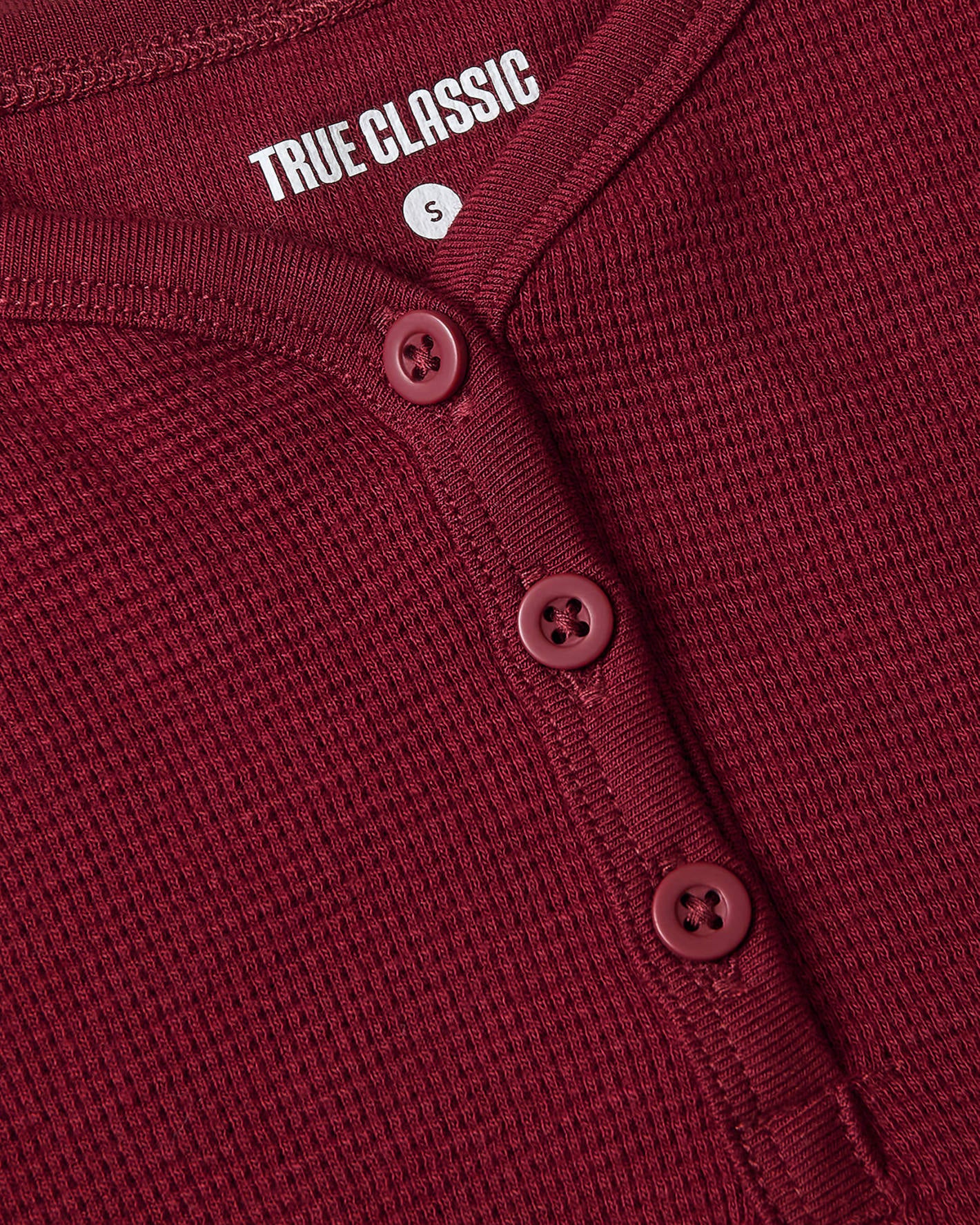 Girls Dark Maroon Long Sleeve Boxy Waffle Henley with ribbed neckline.