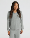 Girl wearing Girls Heather Gray Waffle Long Sleeve Henley & Waffle Leg Pants.