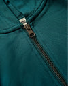 Girls Deep Emerald Cropped Zip Hoodie with visible metal zipper.
