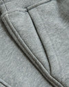Close-up of Boys' Medium Heather Gray Fleece Jogger pocket seam.