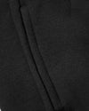 Black knit seam detail of Girls Deep Emerald & Black Relaxed Joggers 2-Pack.