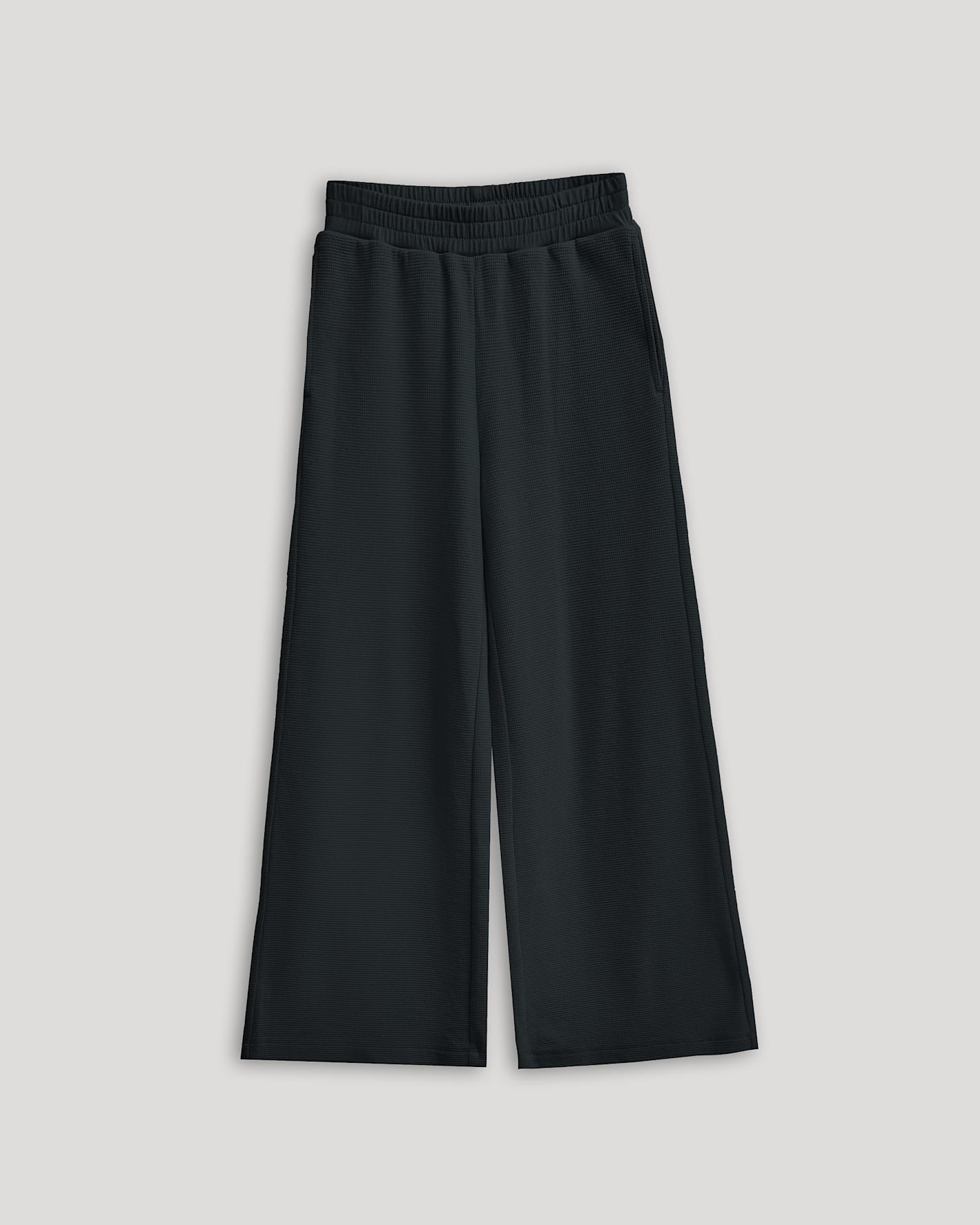 Girls Black Waffle Wide Leg Pants, elastic waistband, laid flat, roomy fit.