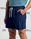 Navy Active Quick Dry Shorts with Liner, featuring drawstrings and sweat-wicking fabric.