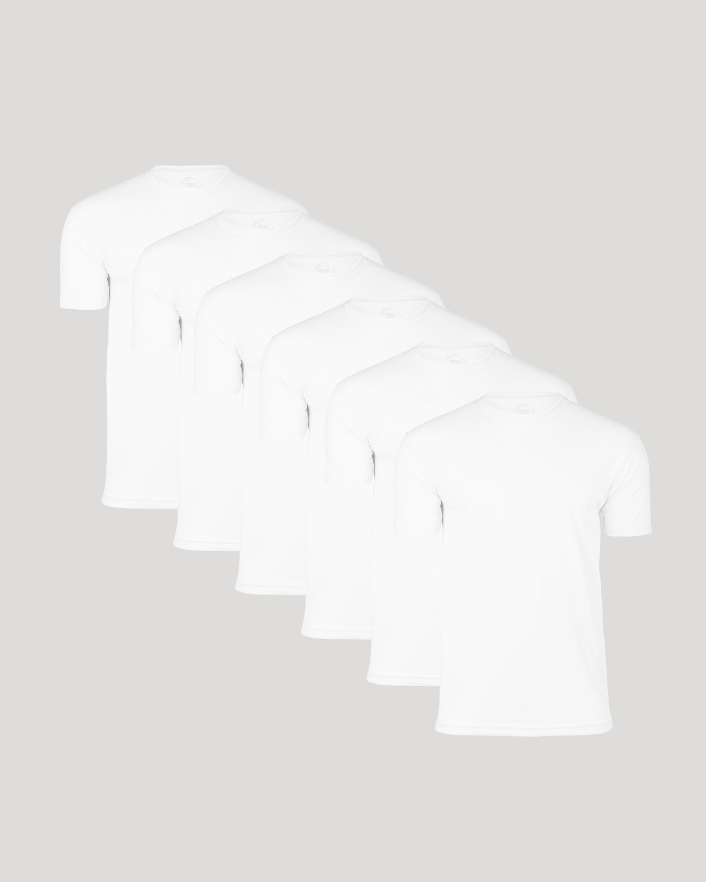 Classic Crew Neck 6-Pack: six white T-shirts, staggered layout.