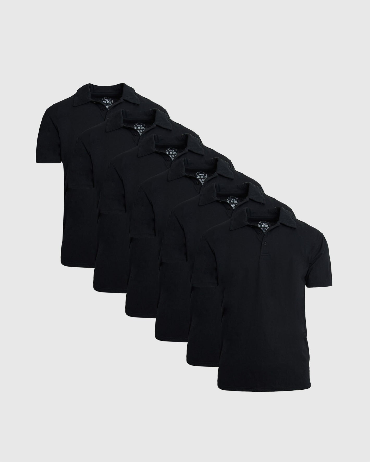 Black Classic Polo 6-Pack, featuring classic collars and short button plackets.