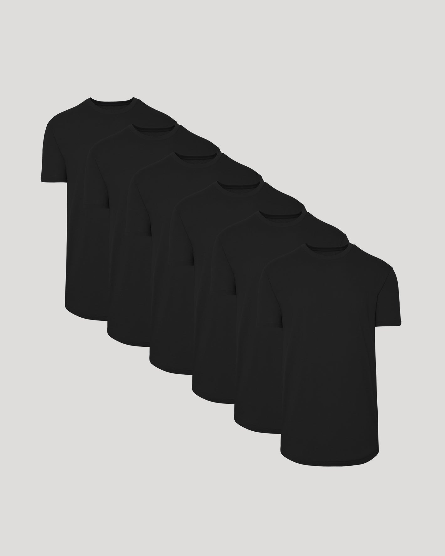 All Black Short Sleeve Tall Curved Hem Crew 6-Pack arranged overlapping.