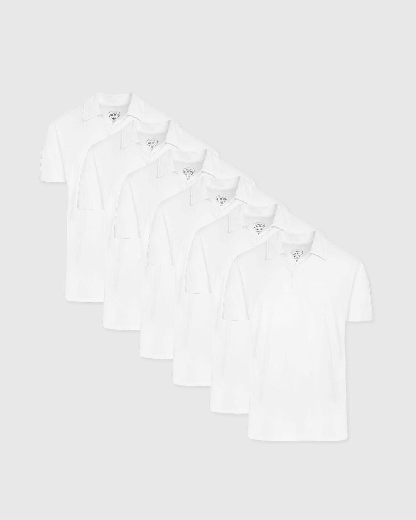 White Classic Polo 6-Pack in staggered layout, showcasing short sleeves and collars.
