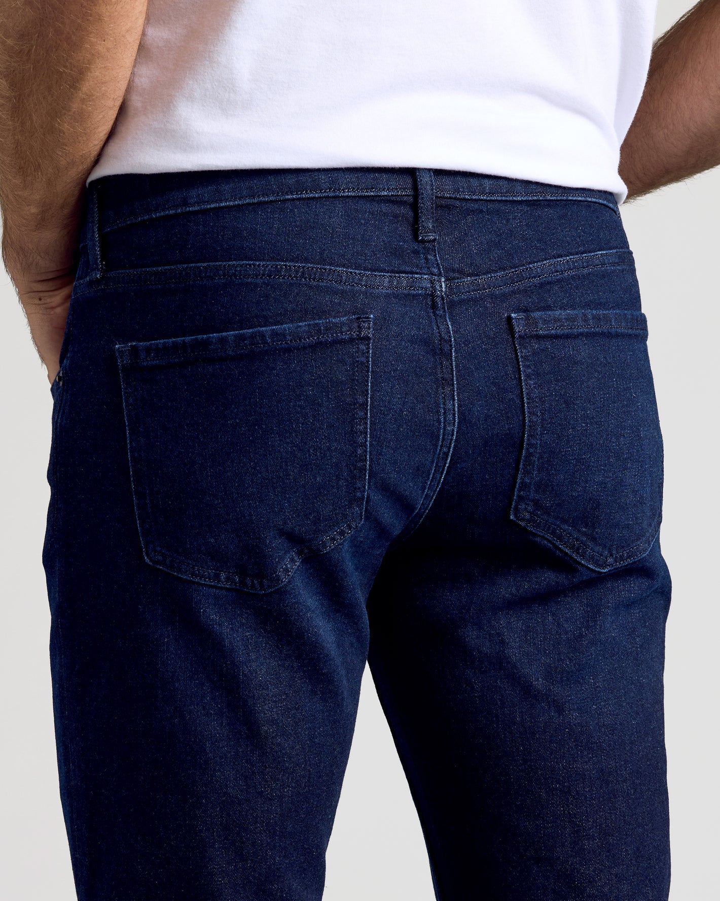 Indigo Rinse Slim Authentic Denim Jeans with back patch pockets.