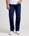 Indigo Rinse Straight Authentic Denim Jeans with white sneakers.