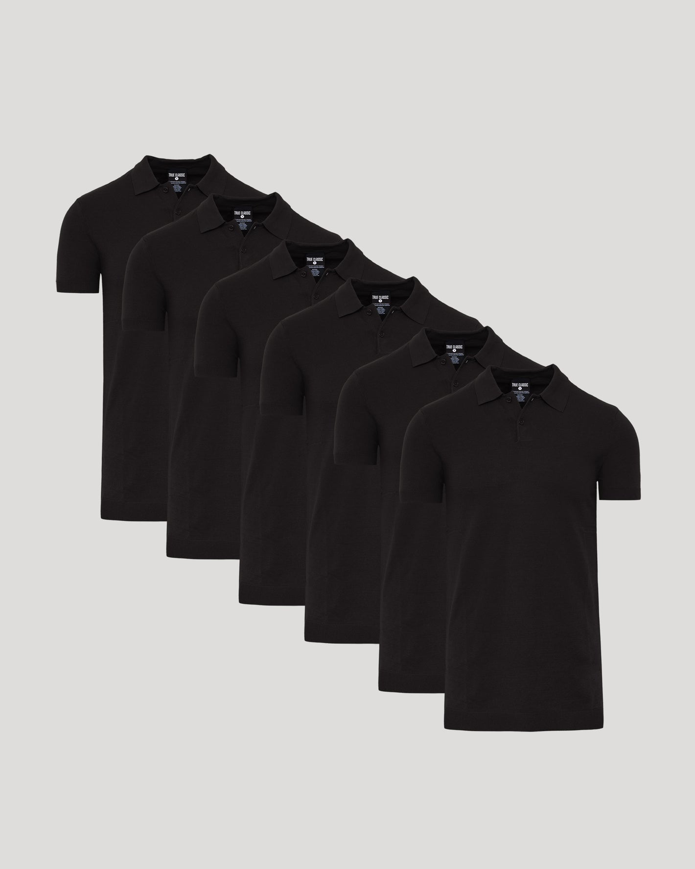 Black Tall Dressy Polo 6-Pack neatly arranged, highlighting sleek design and quality.