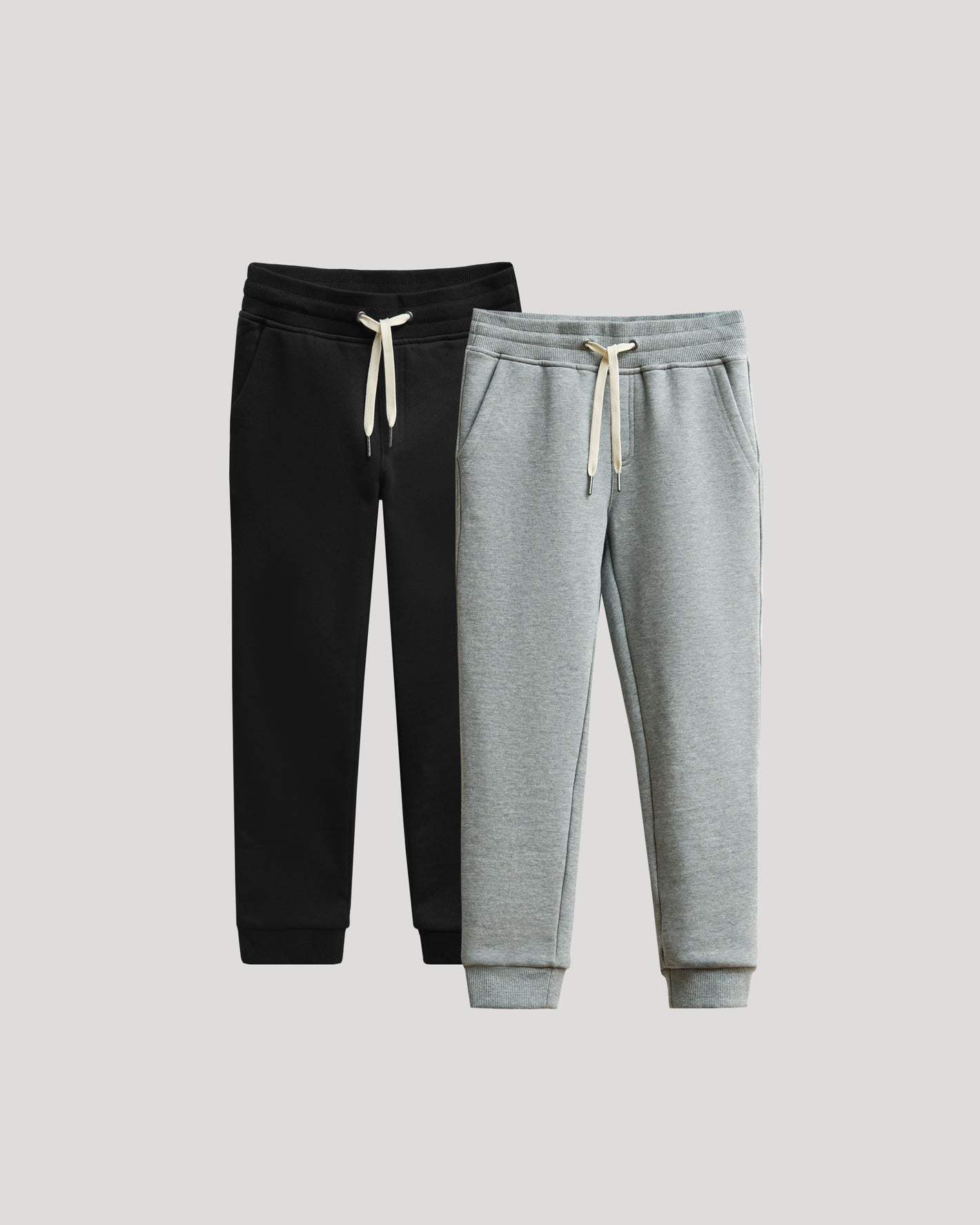 Boys' Black & Medium Heather Gray Fleece Joggers 2-Pack, elastic waistbands, drawstrings.