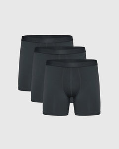 True ClassicCarbon Boxer Briefs 3-Pack arranged in staggered row, showcasing sleek design.