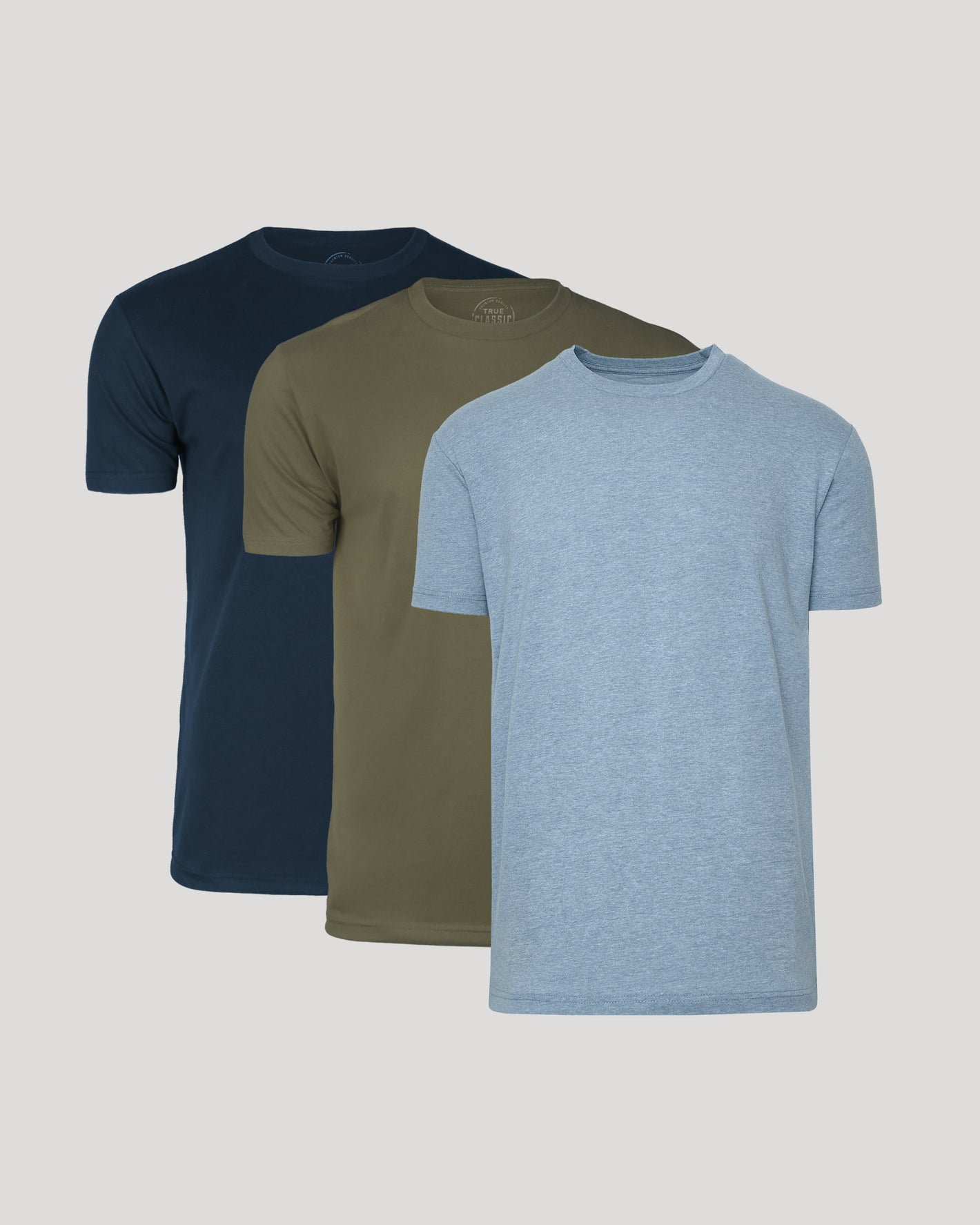 Classic Crew 3-Pack: three layered crew-neck tees in blue, green, navy.