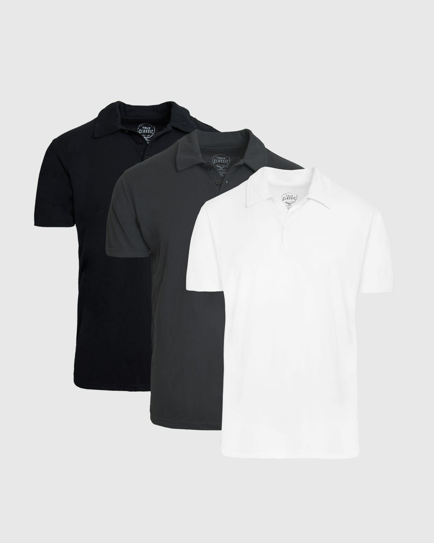 The Essentials Classic Polo 3-Pack in black, gray, and white.