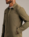 Military Green Coaches Jacket with snap buttons, point collar, and side pockets.