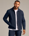 Male model in Navy Coaches Jacket with matching pants.