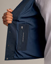 Navy Coaches Jacket showing interior lining and zippered pocket with slogan.