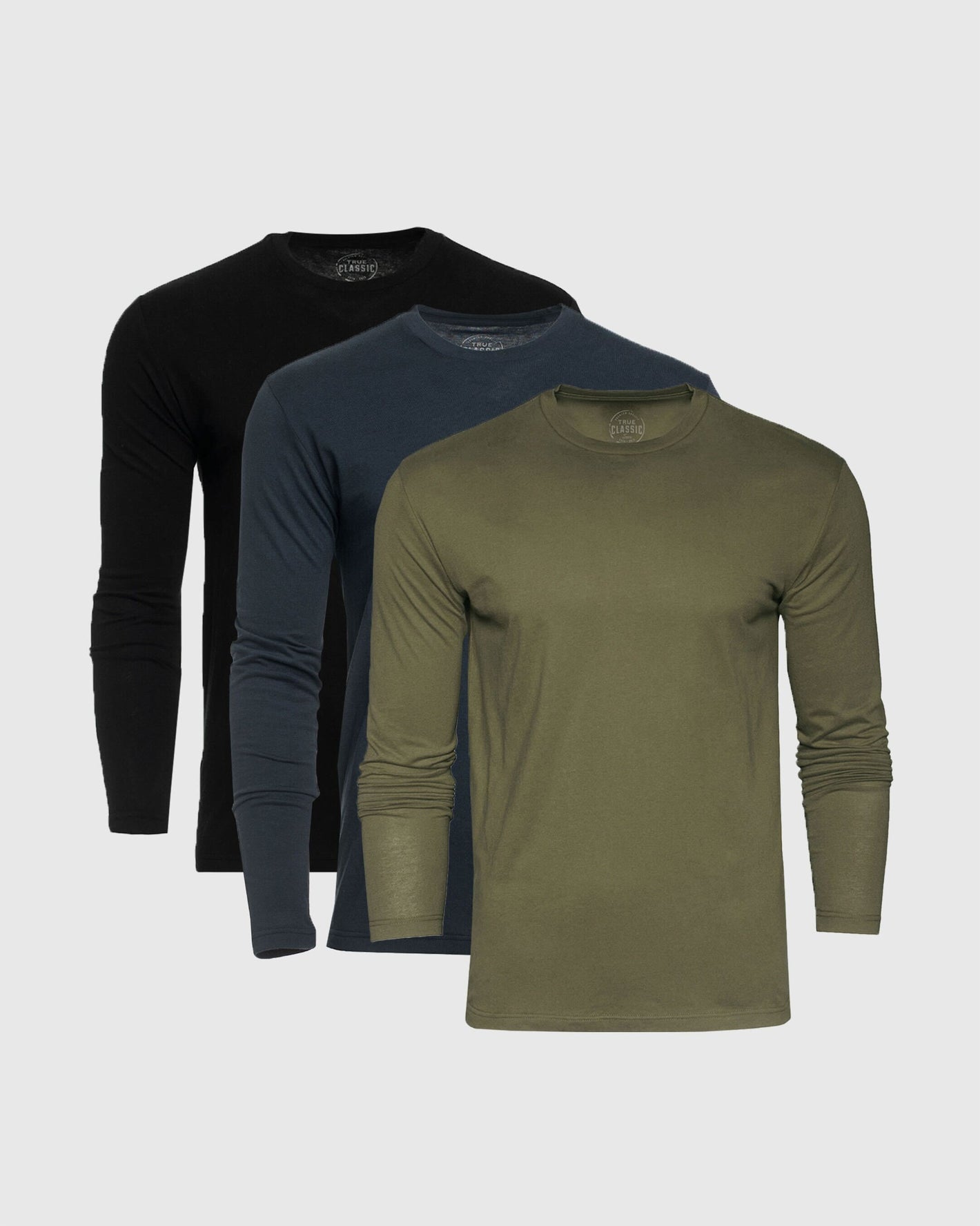 Standard Long Sleeve Crew 3-Pack featuring layered olive, navy, and black shirts.