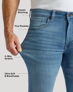 True ClassicMedium Indigo Wash Slim Comfort Stretch Jeans with classic stitching and five pockets.