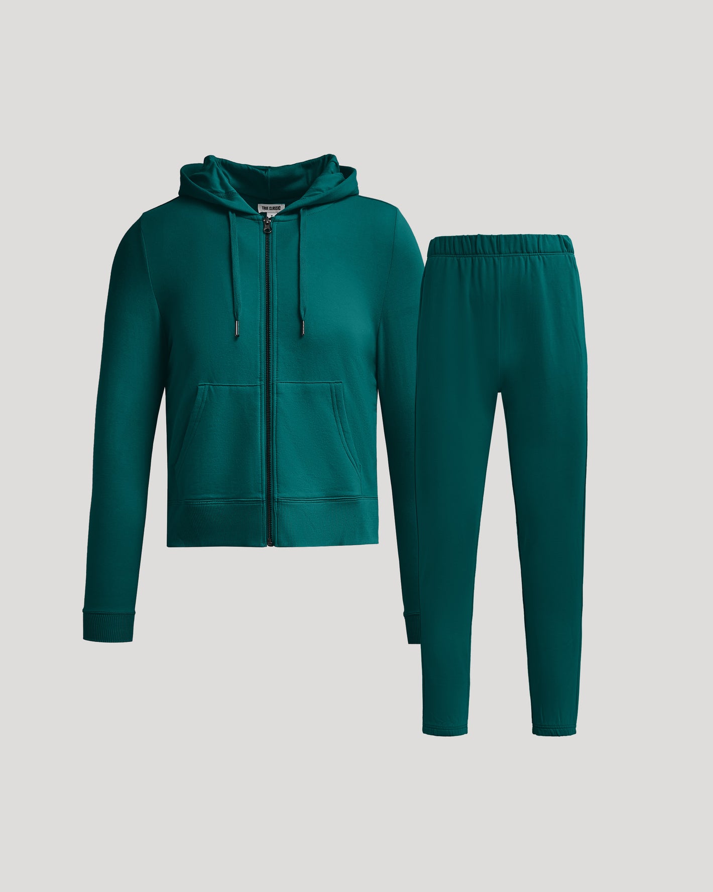 Womens Deep Emerald Crop Zip Hoodie & Relaxed Jogger Set displayed.
