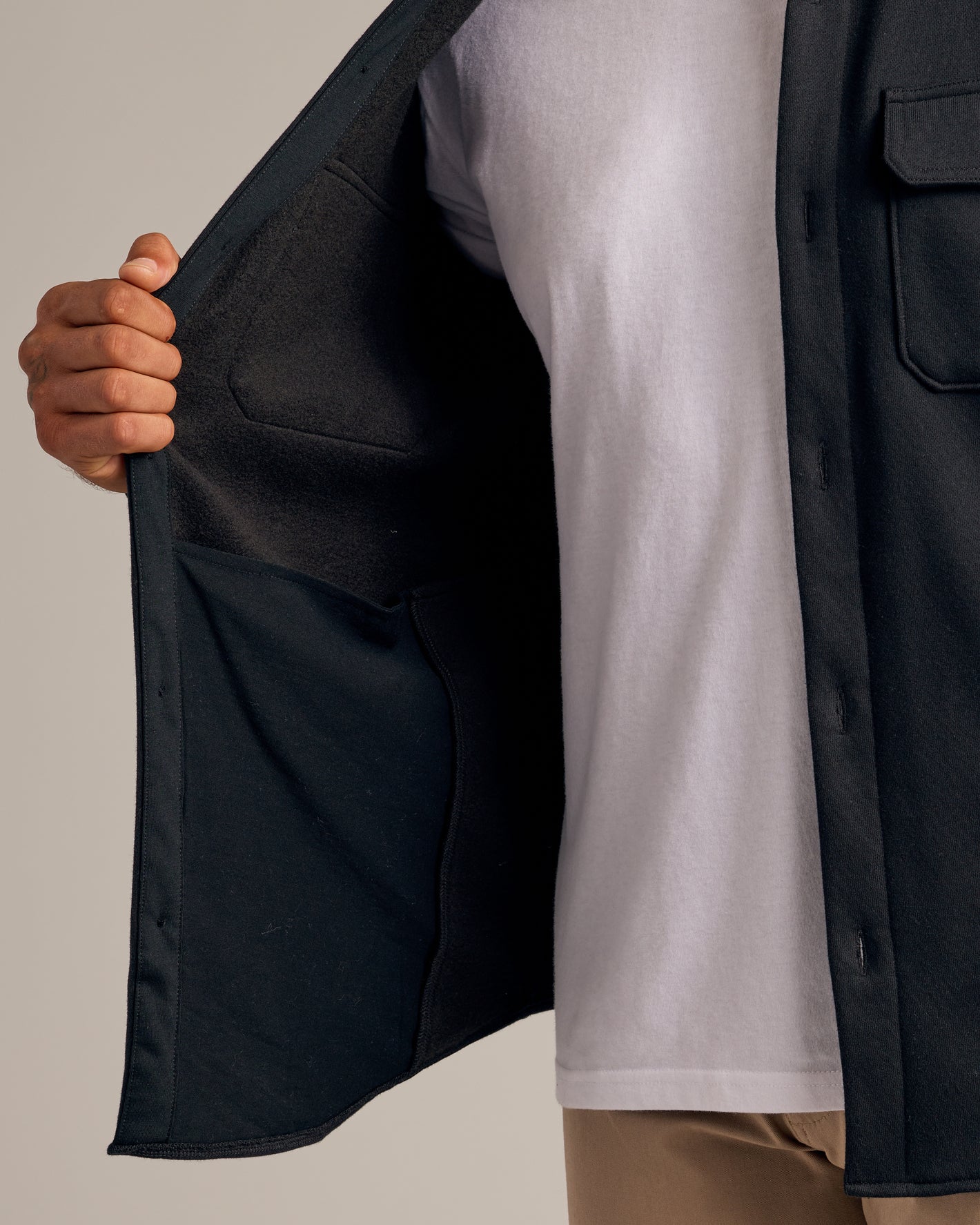 Black Fleece Shirt Jacket with interior pocket shown open.