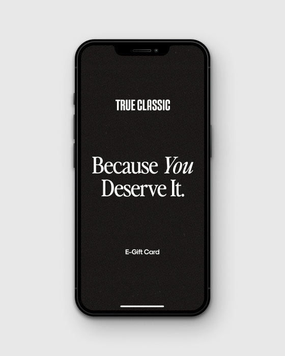True Classic E-Gift Card displayed on iPhone screen with slogan.