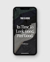 TRUE CLASSIC Gift Card Product Test on smartphone with T-shirt stack.