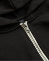 Black Boys' Full Zip Fleece Hoodie close-up, showing silver zipper and fabric.