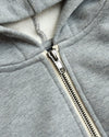 Boys' Medium Heather Gray Full Zip Fleece Hoodie close-up, highlighting soft hood lining and zipper.