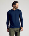 Navy Long Sleeve Active Mesh Crew on male model, side profile.