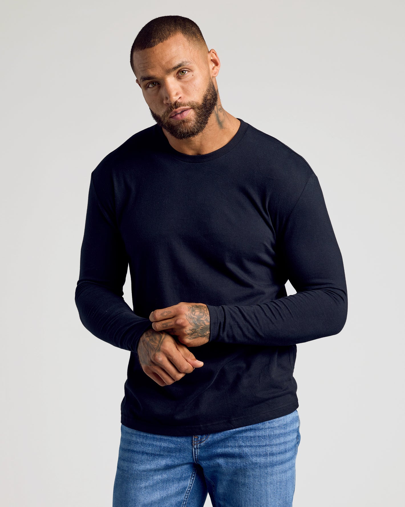 Crew Core Sleeve Variety 6-Pack modeled by man in black long sleeve.