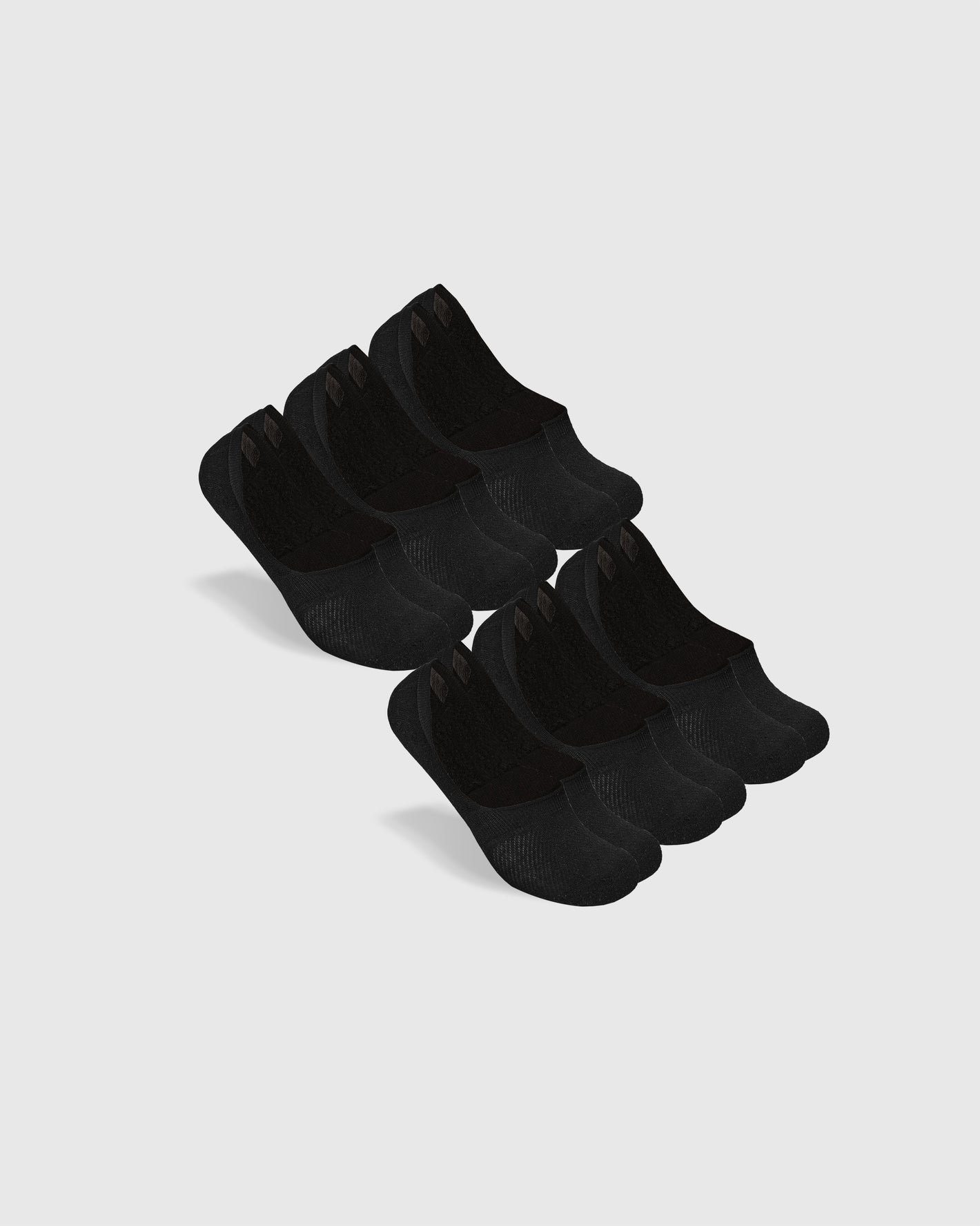 Black Never Show Socks 6-Pack, low-cut design, arranged showcasing shallow ankle openings.