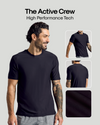 A man wearing a plain black short-sleeve athletic T-shirt is shown against a light gray background, with text reading 'The Active Crew High Performance Tech' and three inset views of the shirt including front, back, and fabric close-up.