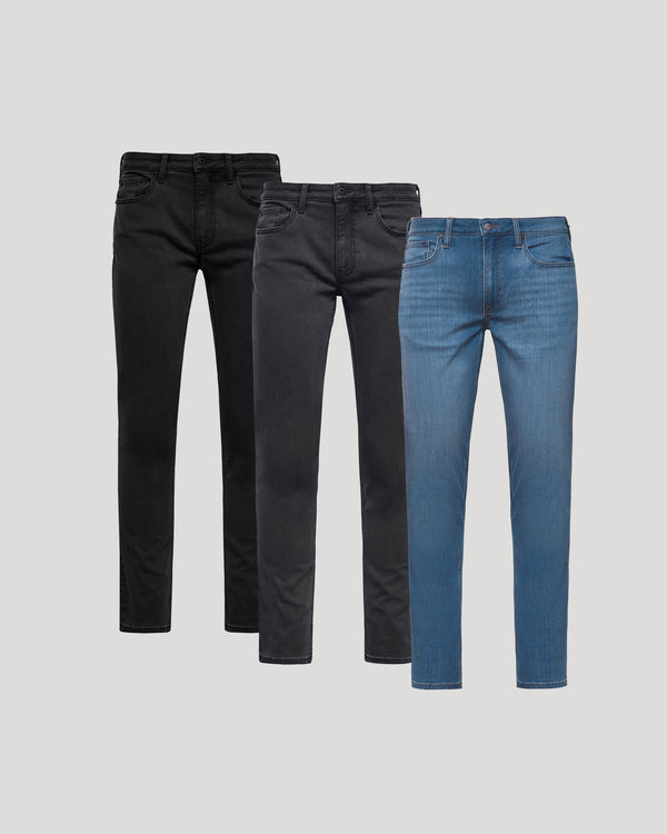 Three pairs of jeans in black and blue on a light gray background