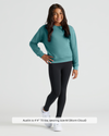 Child models Girls Stormcloud Slouch Pullover Crew with leggings and sneakers.