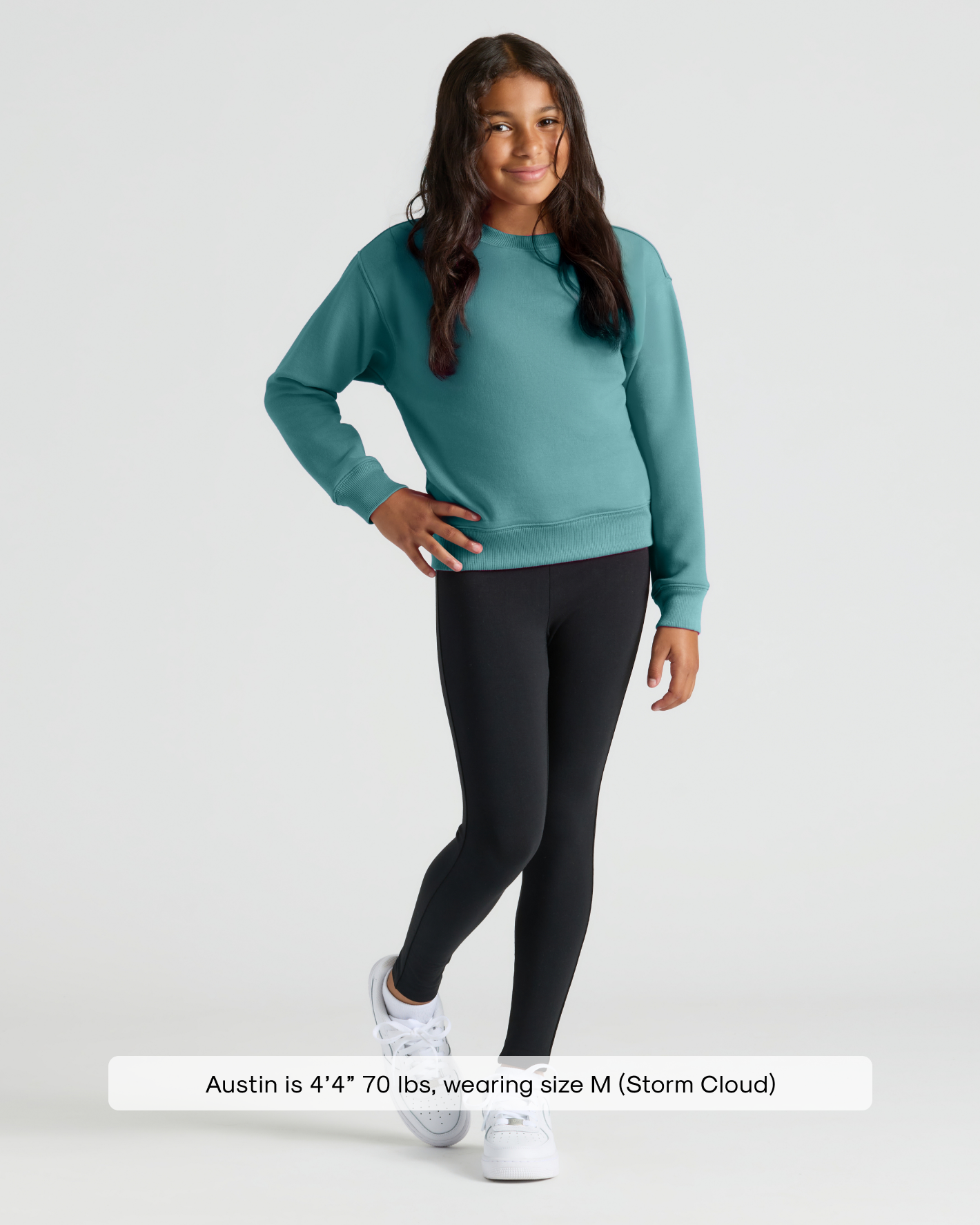 Child models Girls Stormcloud Slouch Pullover Crew with leggings and sneakers.