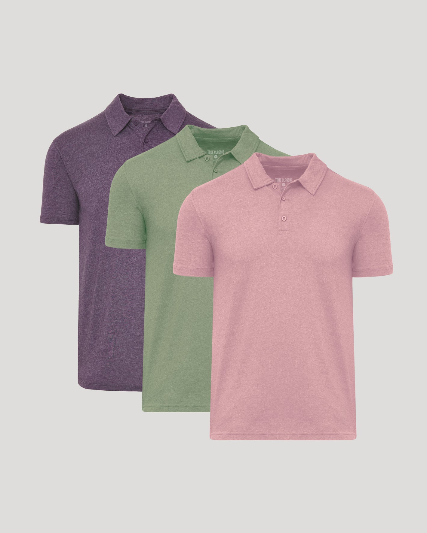 Seasonal Short Sleeve Classic Polo 3-Pack arranged overlapping.