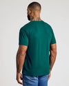 Viridian Classic V-Neck showcased on tattooed model's back.